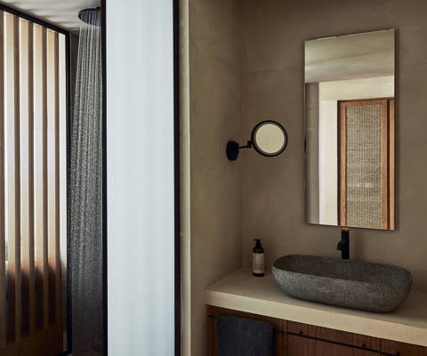Zelia Resort Halkidiki Panorama Suites Sea View shower, washbasin, a big mirror and a small round one
