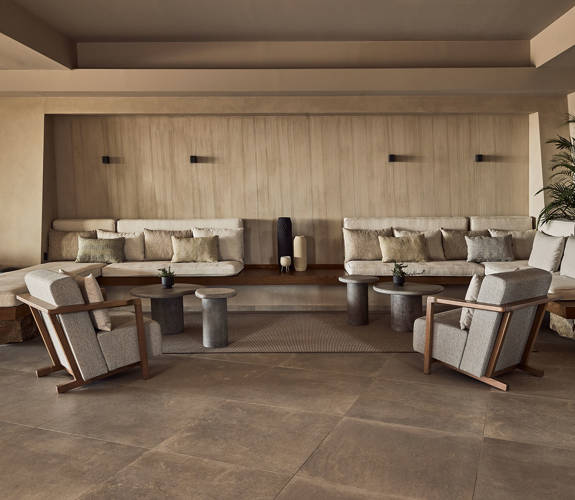 Zelia Resort Halkidiki Hebe Cafe Bar sitting area with couches and armchairs
