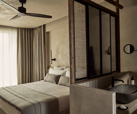 Zelia Resort Halkidiki Deluxe Double Swim Up washbasin, double bed and amenities
