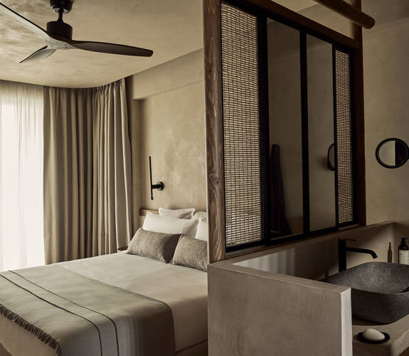 Zelia Resort Halkidiki Deluxe Double Swim Up washbasin, double bed and amenities
