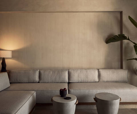Zelia Resort Halkidiki Signature Suite Private Pool big sofa, two small round tables and decorations
